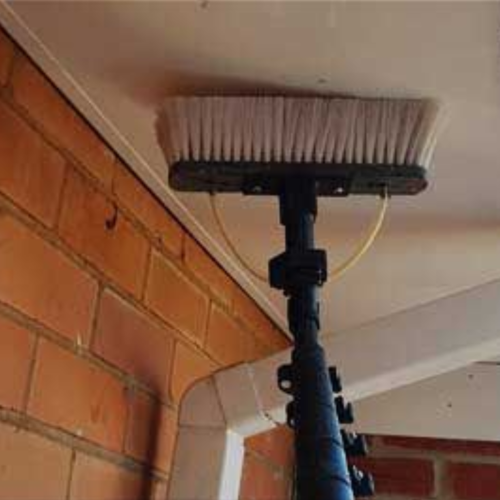 An image of commercial fascia and soffit cleaning of a school